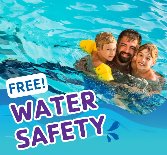 A dad in the pool with his two kids.