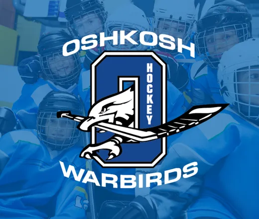 Oshkosh Warbirds. A kids hockey team in a group hug.